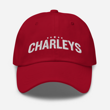 Load image into Gallery viewer, Classic dad hat with red fabric and white thread that says &quot;Charleys&quot; with five white stars.
