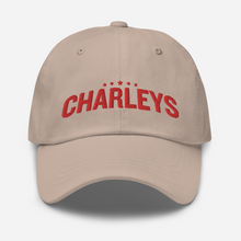 Load image into Gallery viewer, Classic Charleys dad hat with light tan fabric and red thread that says &quot;Charleys&quot; with five red stars on the front. 
