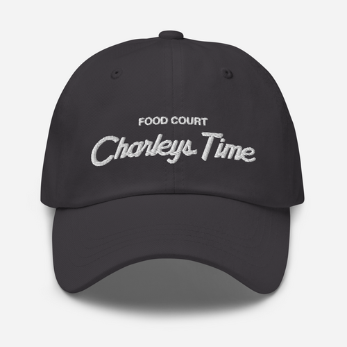 Classic dad hat with grey fabric and white thread that says 